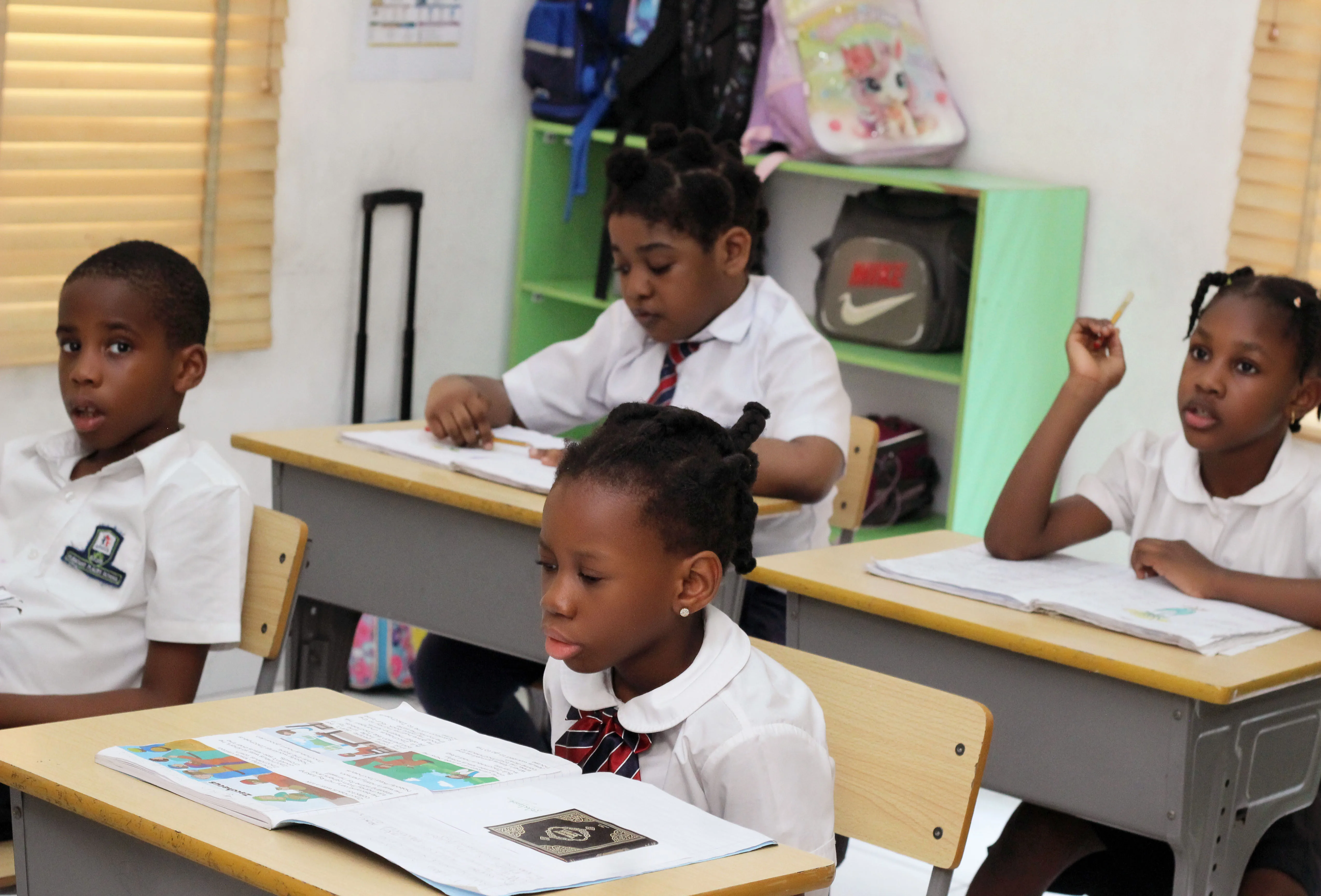 African primary school children learning in classroom at Pleasant Places School Lekki